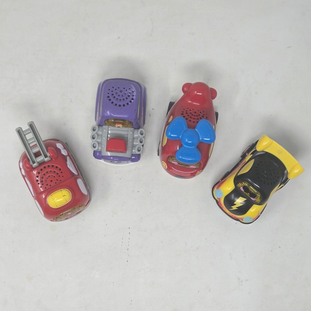 VTech Go! Go! Smart Wheels 4 Car Lot Fire Truck Hot Rod Helicopter Race Car